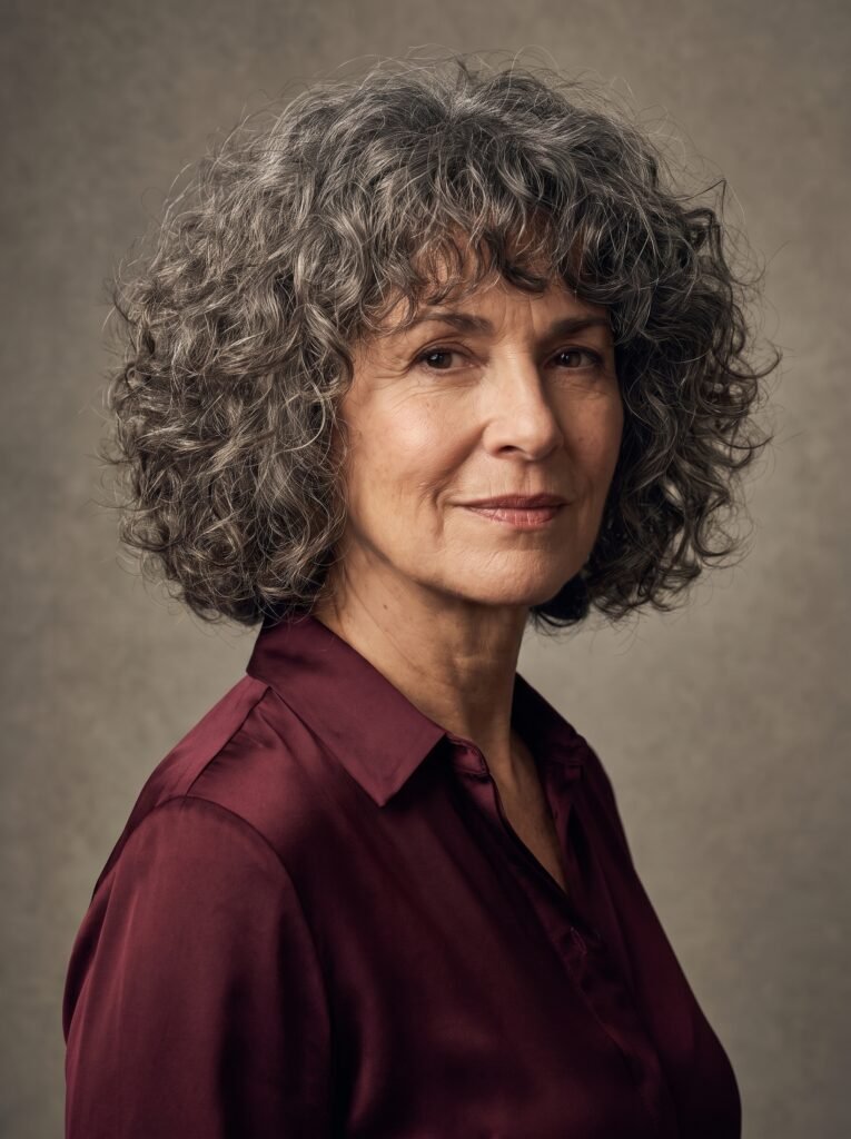 mature woman with curly hair 202608021035